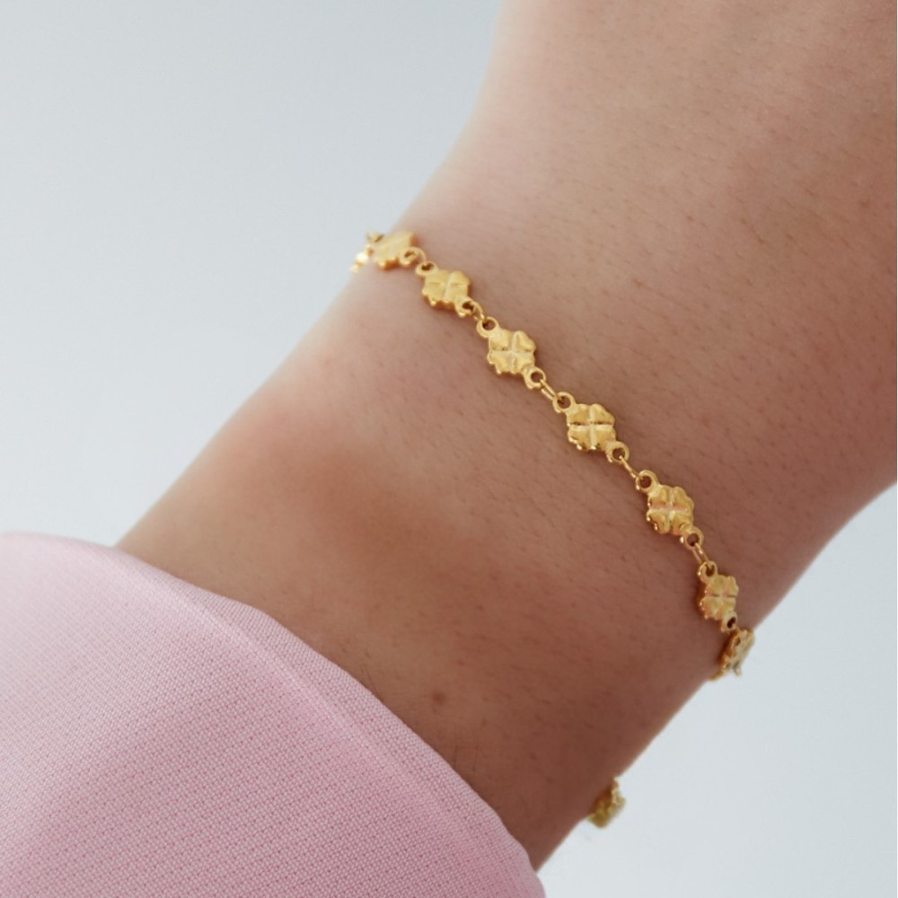 Bracelet doré trèfles porte-bonheur
