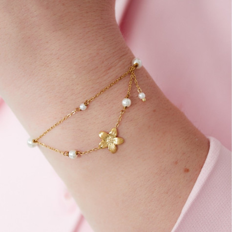 Bracelet doré double chaîne à fleur et perles blanches
