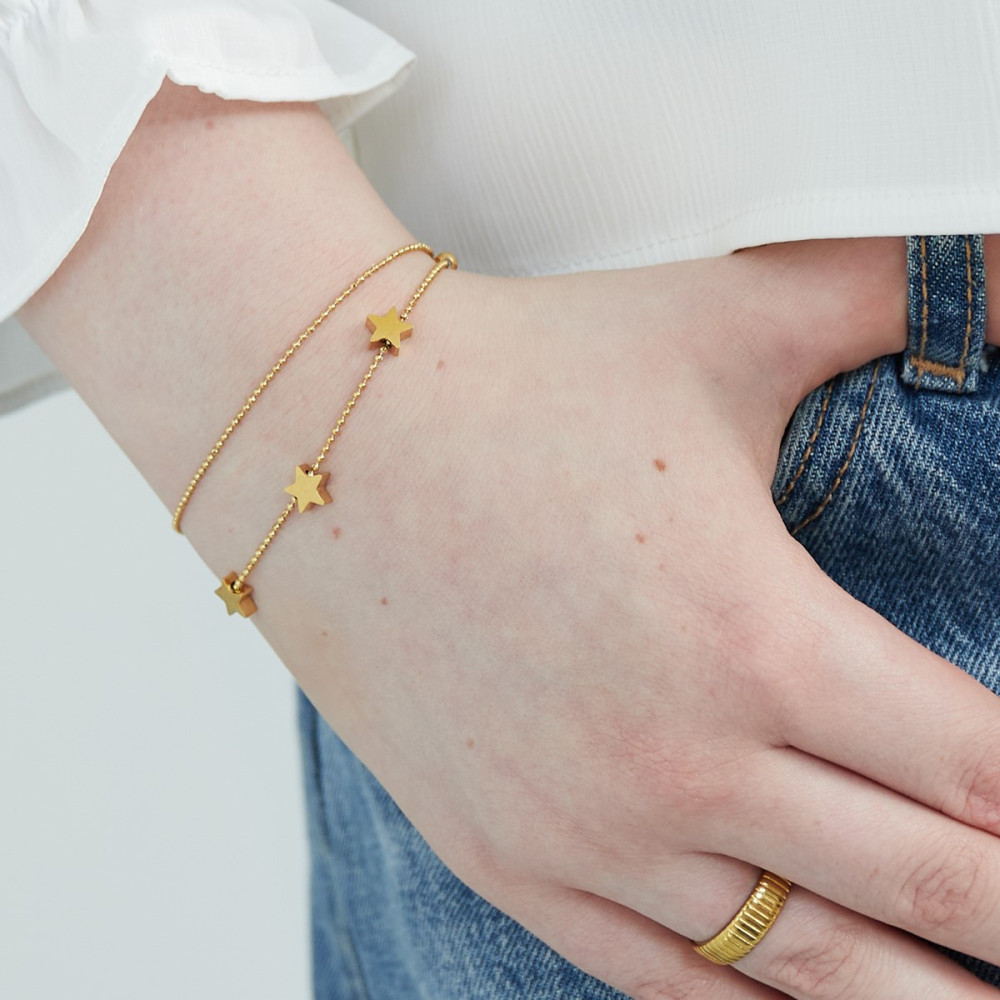 Bracelet doré double chaîne étoilé