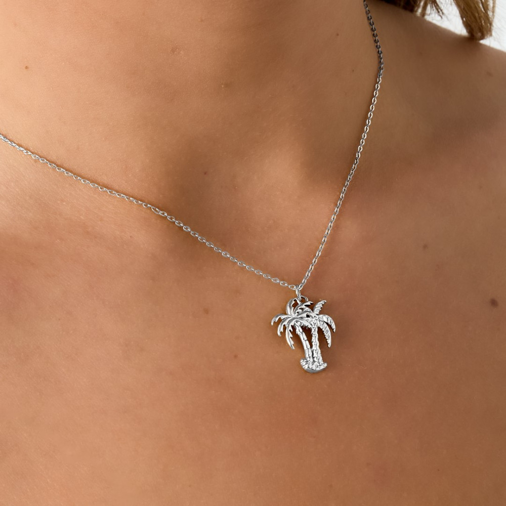 Collier argenté palmiers tropicaux